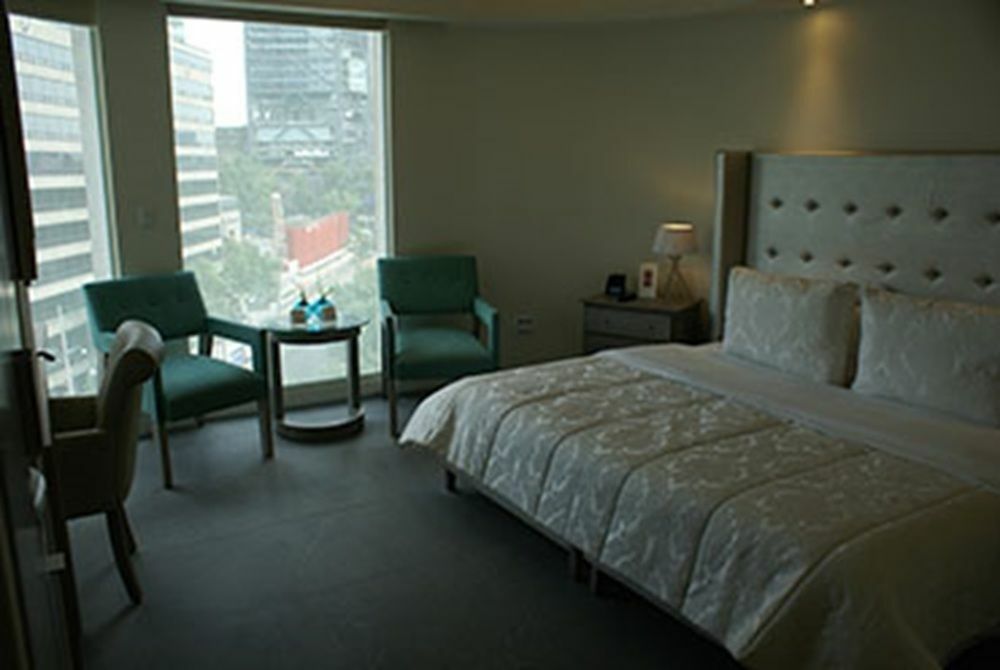 Suites Contempo Ciudad de México Exteriér fotografie A room at the hotel